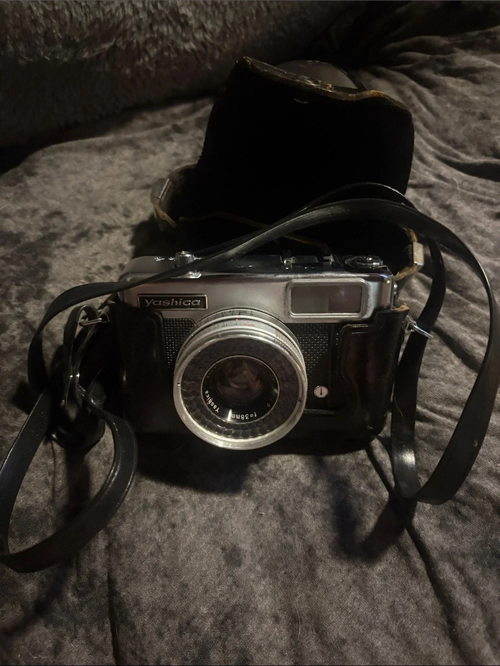 Yashica Black and Silver Film Camera with Circular Flash Ring